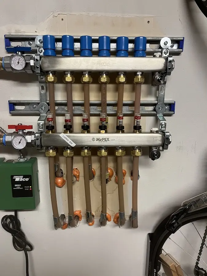 Plumber performing Gas Line Installation at a residential property in Innsbrook